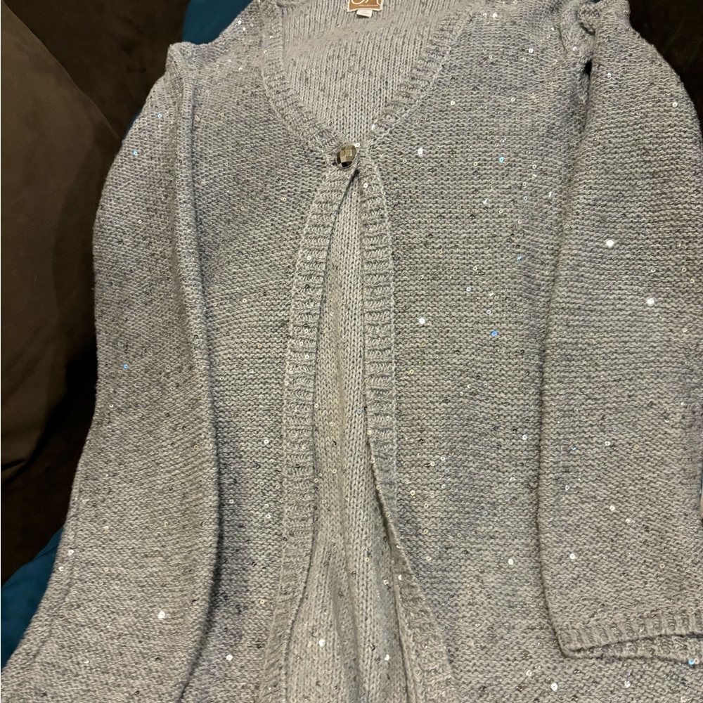Silver sweater w/sequents, size medium.
